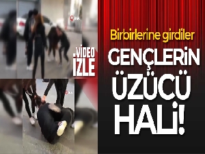 Liseli kızların saç saça baş başa kavgası kamerada