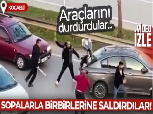 Araçları durdurup sopalarla birbirlerine saldırdılar