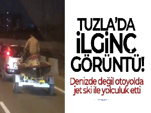 Tuzla'da ilginç görüntü: Denizde değil otoyolda jet ski ile yolculuk etti