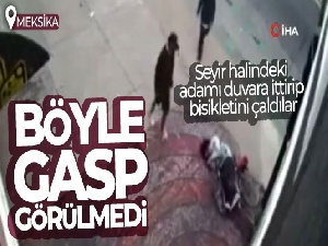 Meksika'da ilginç gasp olayı: Seyir halindeki adamı duvara ittirip bisikletini çaldılar