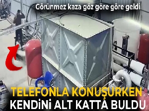 Telefonla konuşurken bodrum kata düştü, o anlar kameraya yansıdı