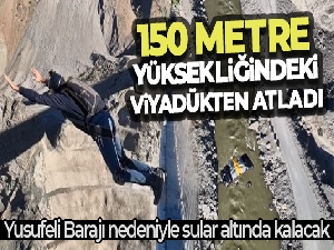 Paraşüt sporcusu köy sular altında kalmadan son atlayışını viyadükten yaptı