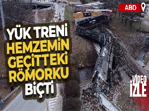 ABD'de yük treni, hemzemin geçitteki römorku biçti