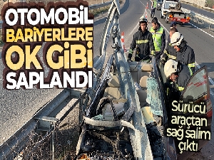 Otomobil bariyerlere ok gibi saplandı, sürücü araçtan sağ salim çıktı