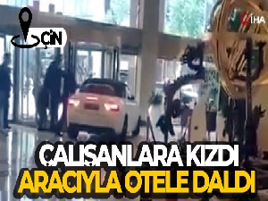 Çalışanlara kızdı, aracıyla otele daldı