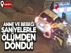 Anne ve bebeğinin saniyelerle ölümden döndüğü kaza kamerada