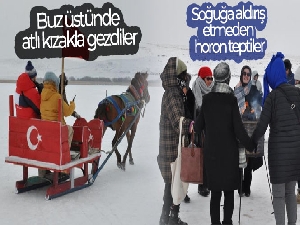 Kars'ta buz üstünde atlı kızakla gezdiler, soğuğa aldırış etmeden horon teptiler
