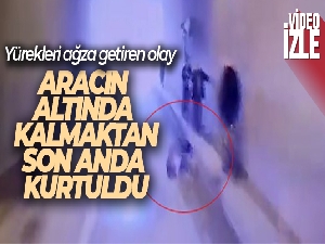 Araç alt geçidini kullanan kişi otomobilin altında kalmaktan kıl payı kurdu
