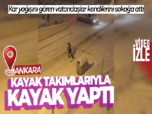 Ankara'da karla kaplı sokakta kayak keyfi kamerada