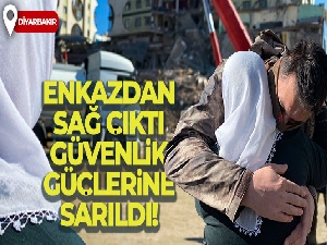 Enkazdan sağ çıktı, güvenlik güçlerine sarıldı