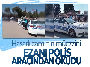Hasarlı caminin müezzini, ezanı polis aracından okudu