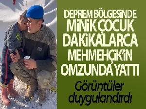 Minik çocuk dakikalarca Mehmetçik'in omzunda yattı