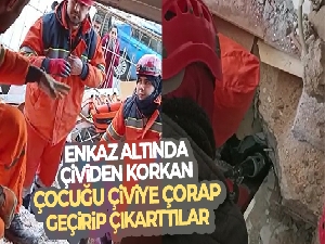 Enkaz altında çividen korkan çocuğu çiviye çorap geçirip çıkarttılar