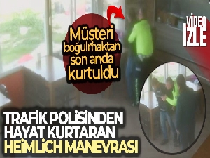 Trafik polisinden hayat kurtaran Heimlich manevrası