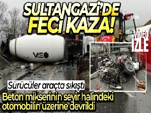 Sultangazi'de kaza yapan beton mikseri otomobilin üzerine devrildi: 2 yaralı