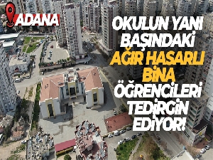 Okulun yanı başındaki ağır hasarlı bina öğrencileri tedirgin ediyor