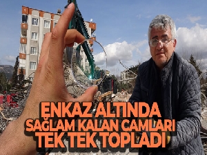 Enkaz altında sağlam kalan camları tek tek topladı