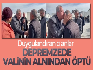 Depremzede, valinin alnından öptü