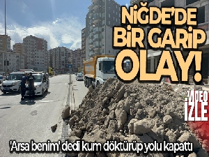 'Arsa benim' dedi, kum döktürüp yolu kapattı