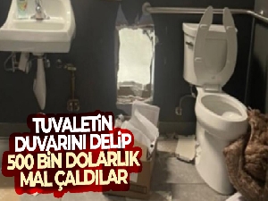 Tuvaletin duvarını delip 500 bin dolarlık mal çaldılar