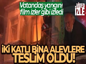 İki katlı bina alevlere teslim oldu, vatandaş yangını film izler gibi izledi