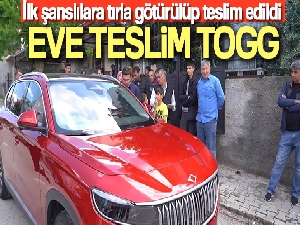İlk şanslılara Togg'ları tırla evlerine kadar götürülüp teslim edildi