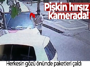 Pişkin hırsız herkesin gözü önünde kargo aracındaki paketleri çaldı