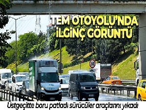 TEM Otoyolu'nda ilginç görüntü: Üstgeçitte boru patladı, sürücüler araçlarını yıkadı