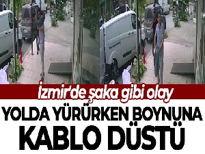 İzmir'de şaka gibi olay: Yolda yürürken boynuna kablo düştü