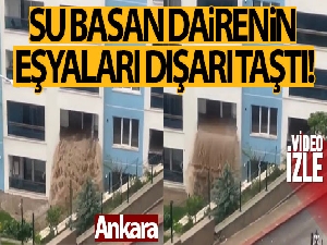 Başkent'te su basan dairenin eşyaları dışarı taştı