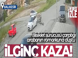 Balıkesir'de bisiklet sürücüsü çarptığı arabanın römorkuna düştü