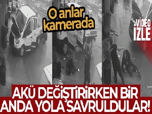 Akü değiştirken bir anda yola savruldular, o anlar kamerada