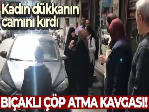 İstanbul'da bıçaklı çöp atma kavgası kamerada: Kadın dükkanın camını kırdı