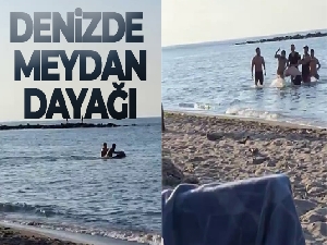 Çevreye rahatsızlık verdiği iddia edilen kişiye denizde meydan dayağı