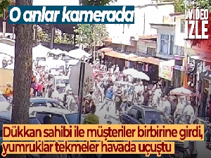 Dükkan sahibi ile müşteriler birbirine girdi, yumruklar tekmeler havada uçuştu