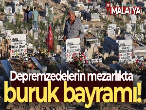 Depremzedelerin mezarlıkta buruk bayramı