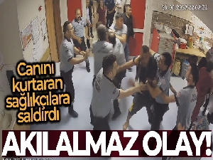 Canını kurtaran sağlıkçılara saldırdı, o anlar kameraya yansıdı