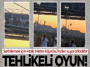 Haliç'te tehlikeli oyun: Serinlemek için Haliç Metro Köprüsü'nden suya atladılar