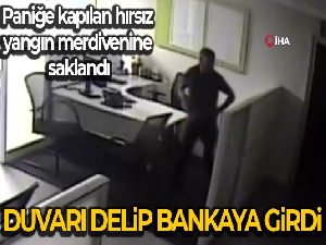 Duvarı delip bankaya girdi, alarm çalınca yakalandı