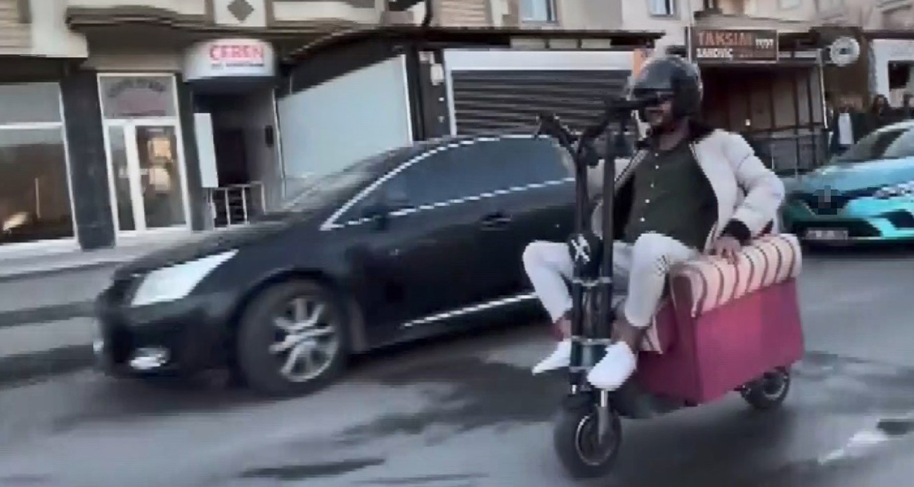 Scooter’a yerleştirdiği koltukla trafiğe çıktı