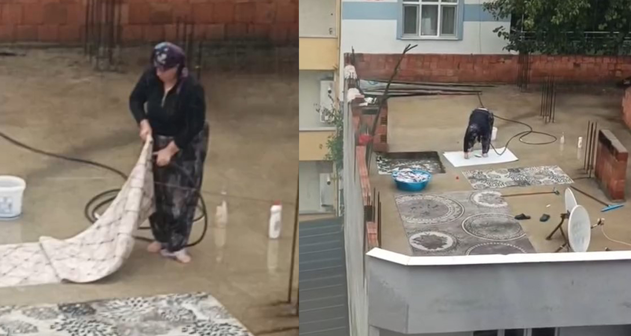 Yağmurlu havada çatıda halı yıkadı, görenler şaştı kaldı