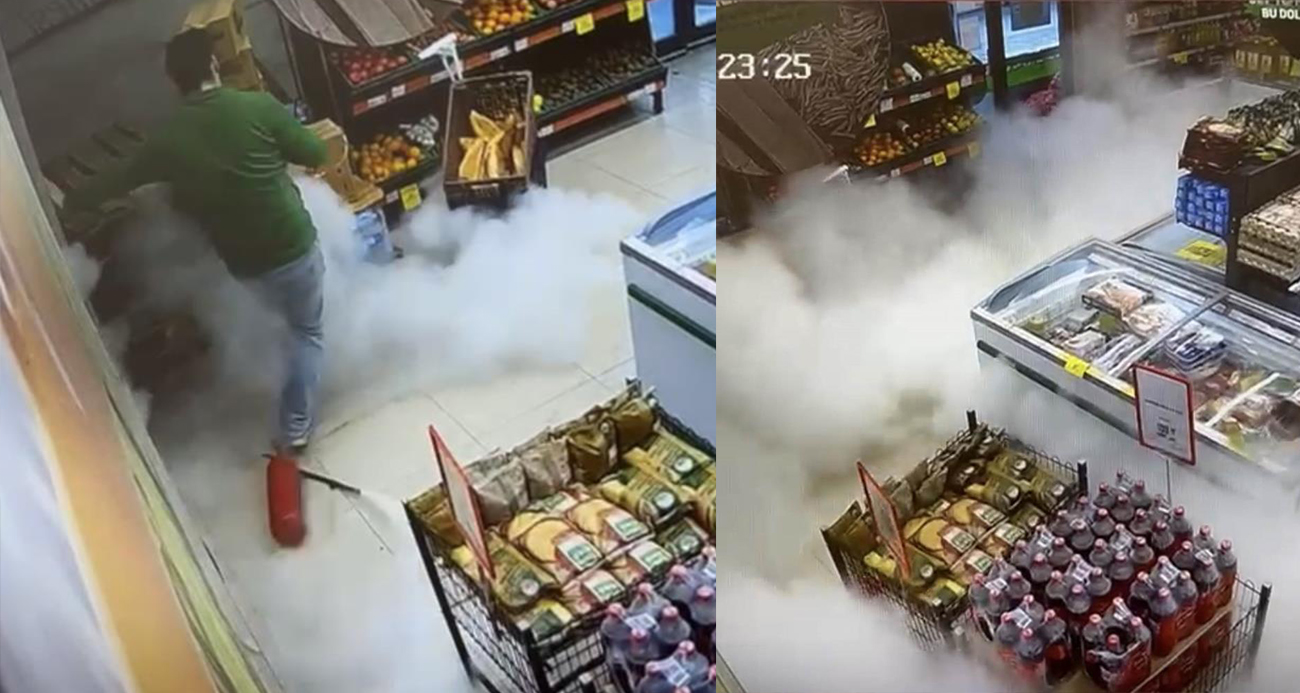 Markette ilginç anlar: Yangın tüpü yere düştü, çalışan panikle kaçtı