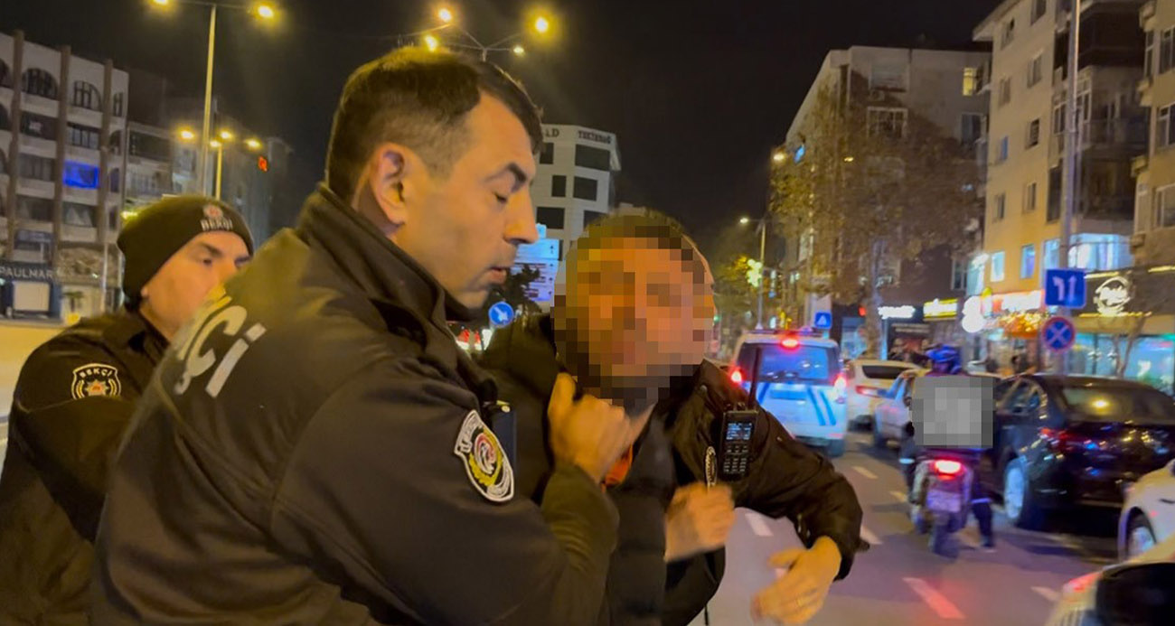 Tartıştığı gencin başında içki şişesini kırdı