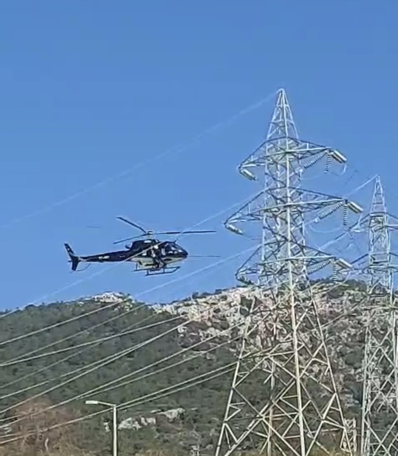 Bodrum’da yüksek gerilim hatları helikopterle temizlendi