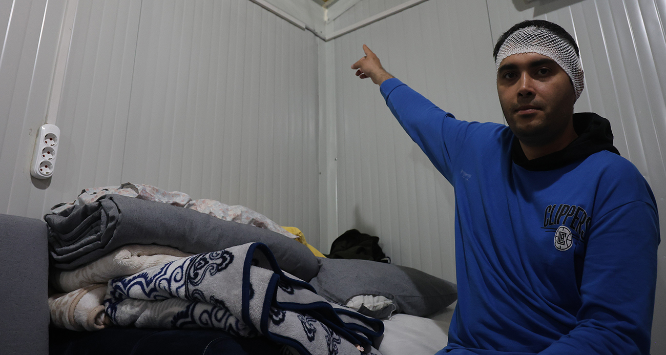 Bayram günü konteyneri delip geçen yorgun merminin kafasına isabet etmesiyle kabusu yaşadı