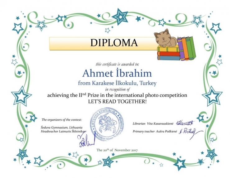 Kedisiyle Kitap Okuduğu Fotoğrafı Ödül Getirdi