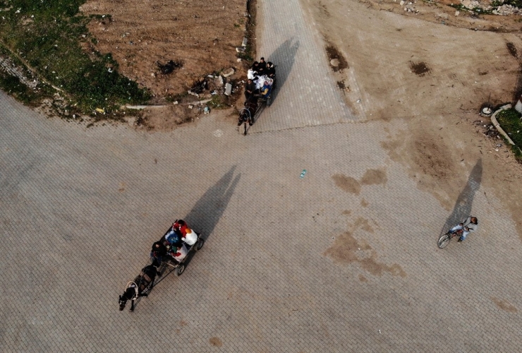 Göçmenlerin At Arabasıyla Alışveriş Yolculuğu